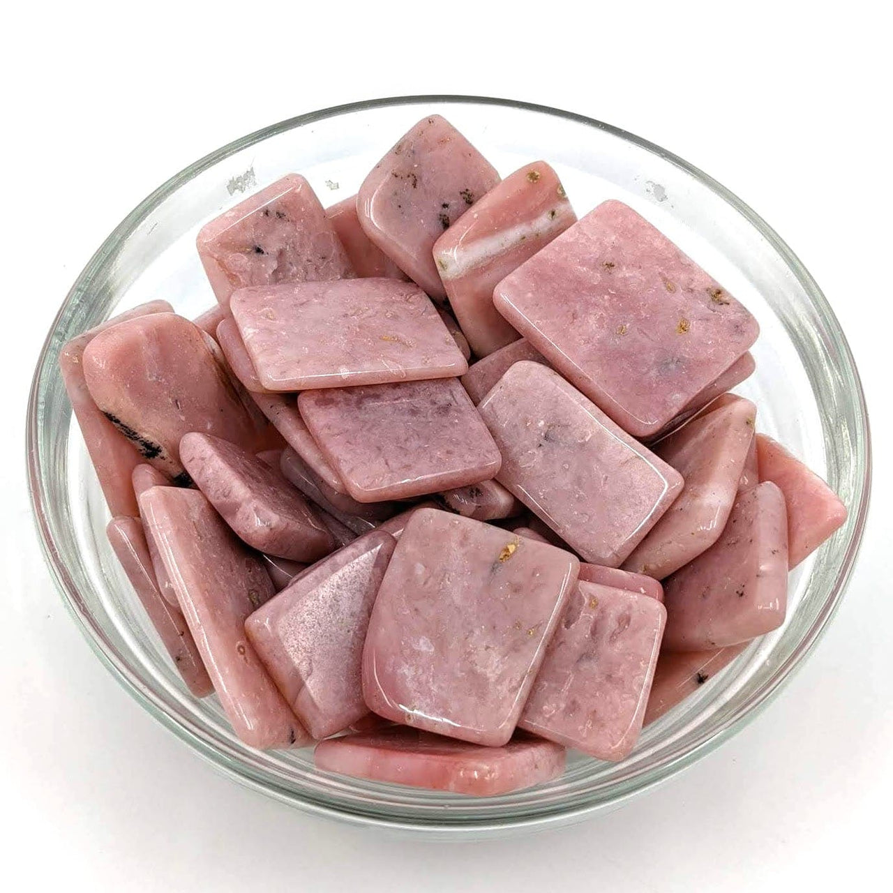 Raw pork pieces in a bowl beside Pink Opal Slice #SK7405, perfect for gourmet cooking