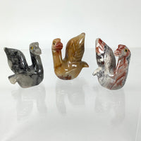 Thumbnail for Three baby birds made of soapstone sitting on a table – handcrafted carving from Peru