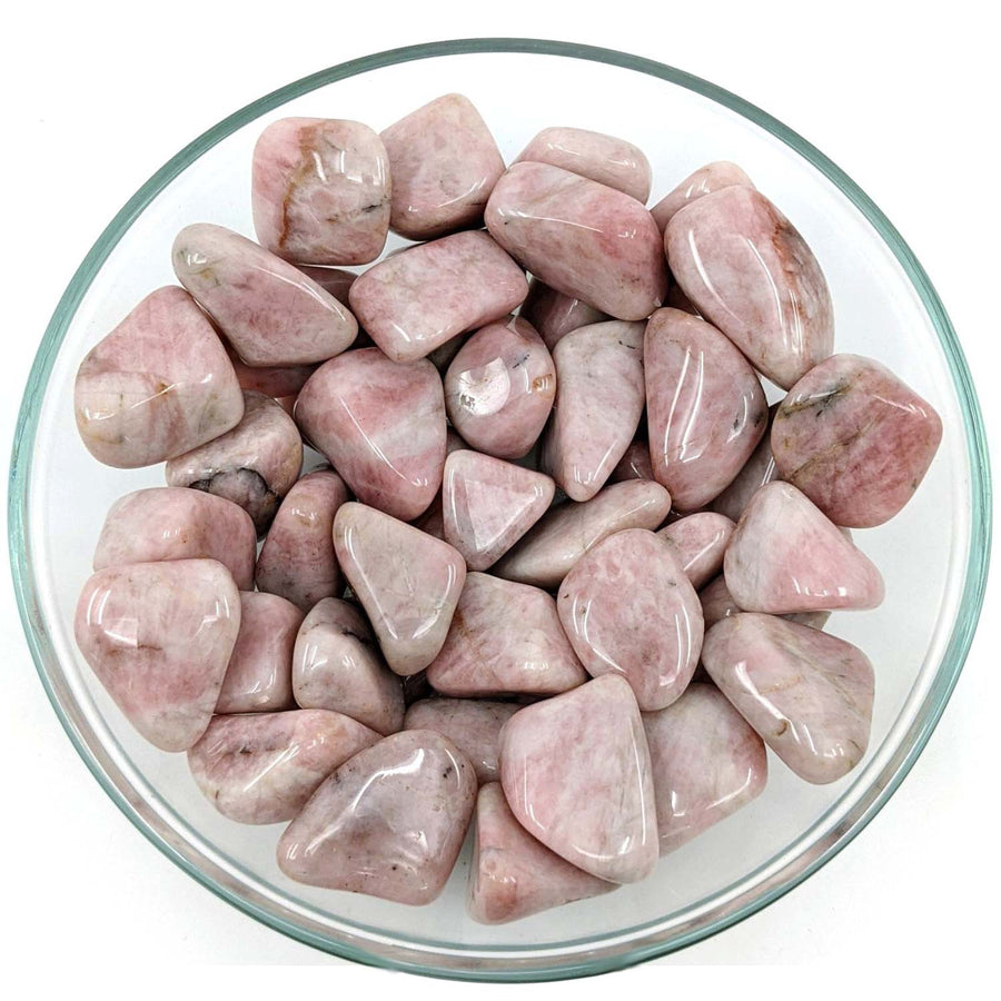 Polished Strawberry Quartz Tumbled Stone showcasing beautiful pink hues and smooth texture