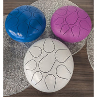Three 8-inch colorful handpan tongue drums in white, blue, pink