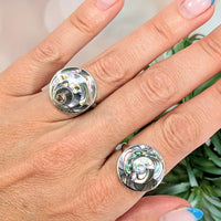 Thumbnail for Close-up of a woman’s hand wearing two Abalone Round Inlay Adjustable Rings #LV2784