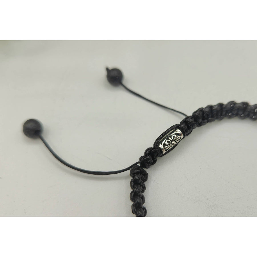 Black braided bracelet with silver accents from ABUNDANCE Tiger’s Eye Jade Citrine Unisex Bracelet