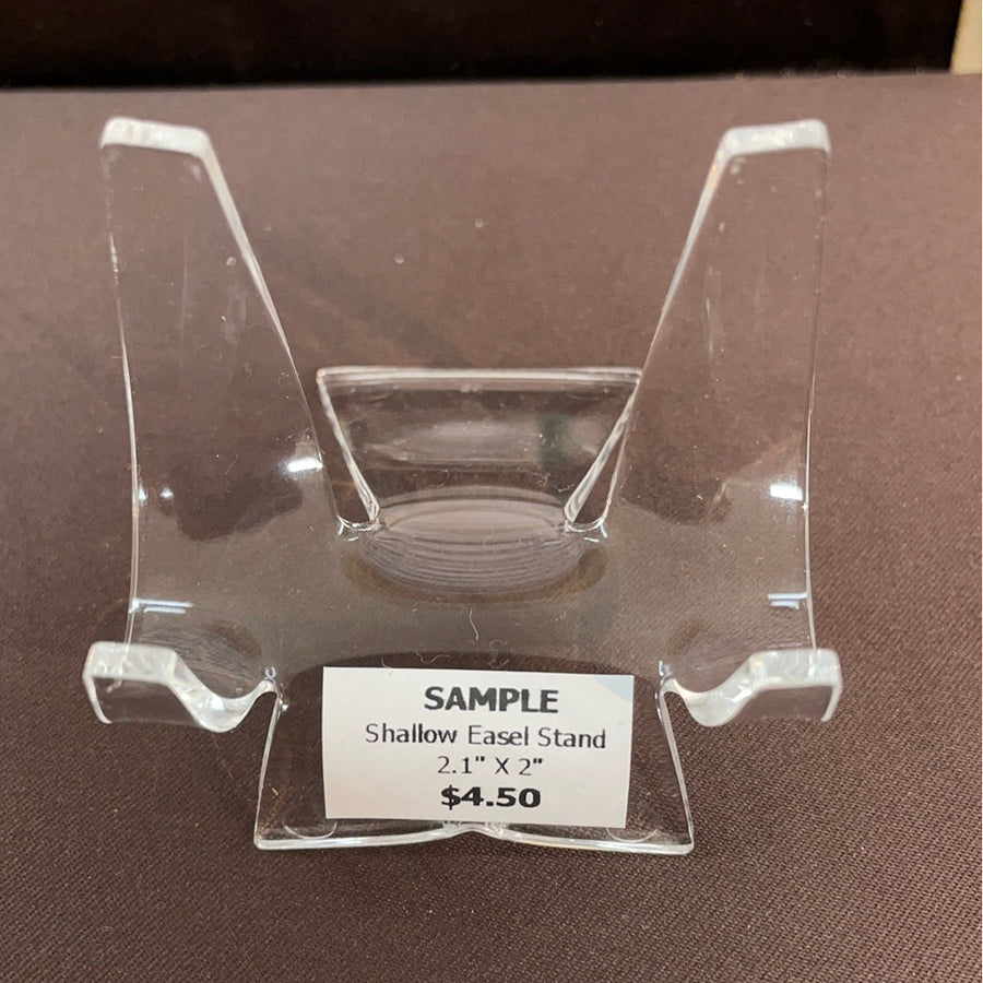 Clear plastic easel stand with a price tag of $4.50 for Acrylic & Metal Stands Q152