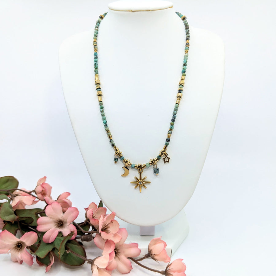 Beaded African Turquoise 17-inch charm necklace with celestial charms Beautiful jewelry