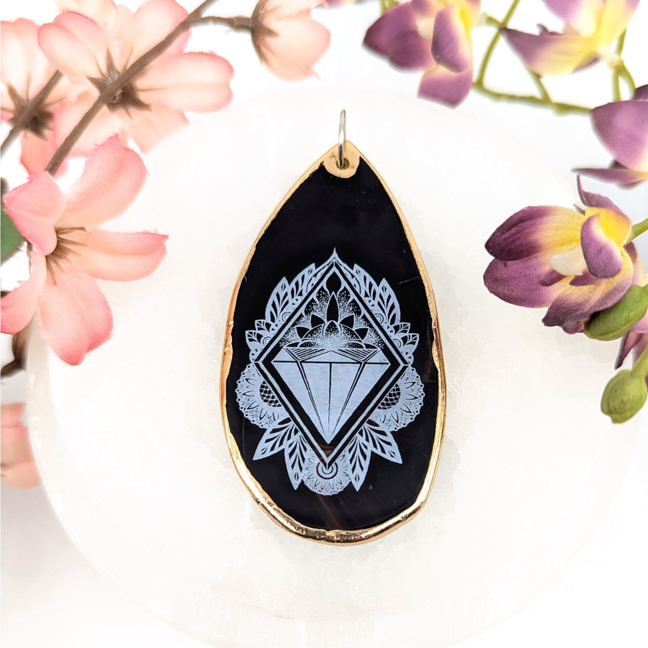 Black tear-drop Agate Pendant with gold edge, white diamond, and floral design