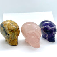 Thumbnail for Three colorful crystal skulls in yellow/brown, pink, and purple for Alien Head Carving