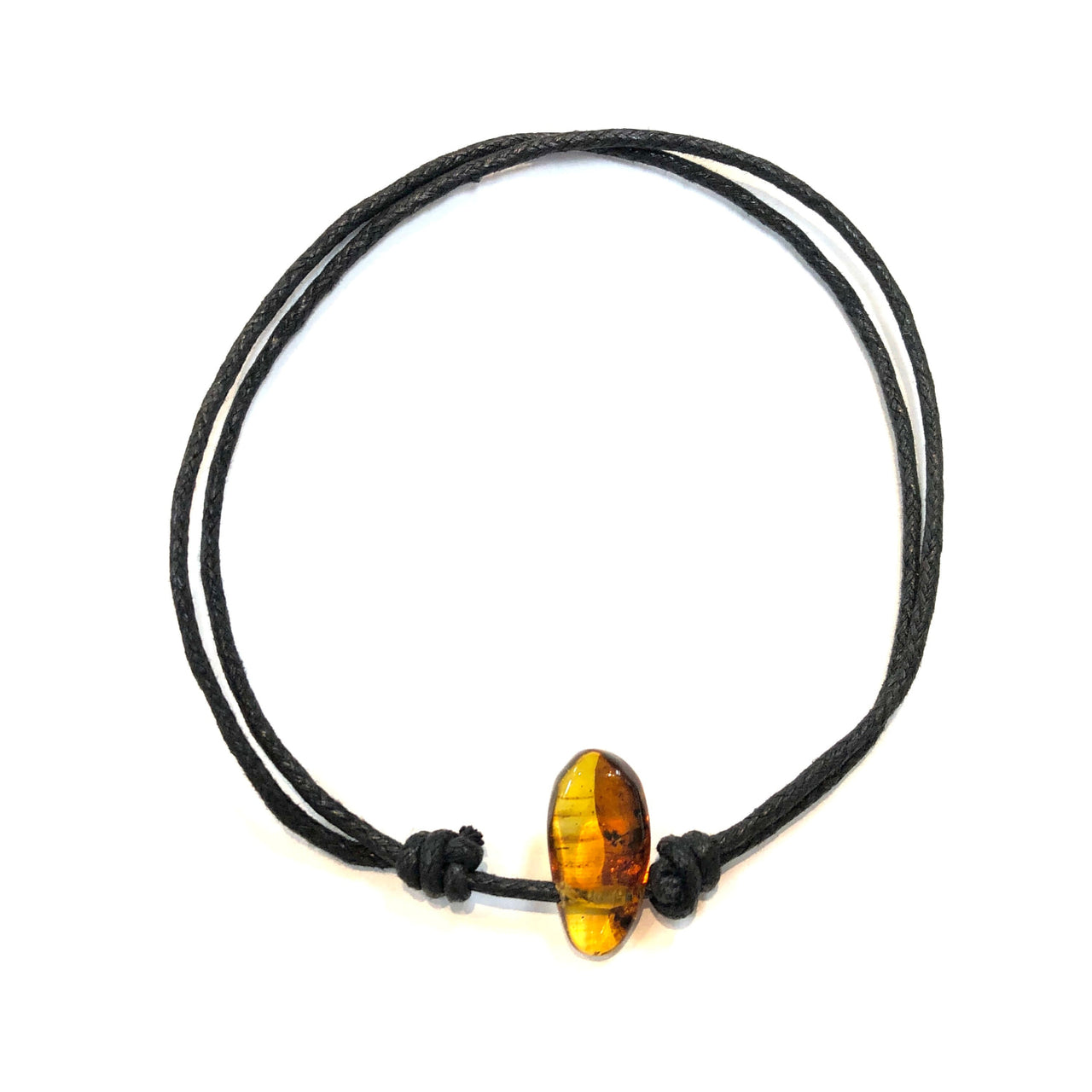 Black cord bracelet with amber bead, part of the Amber Necklace J563 collection