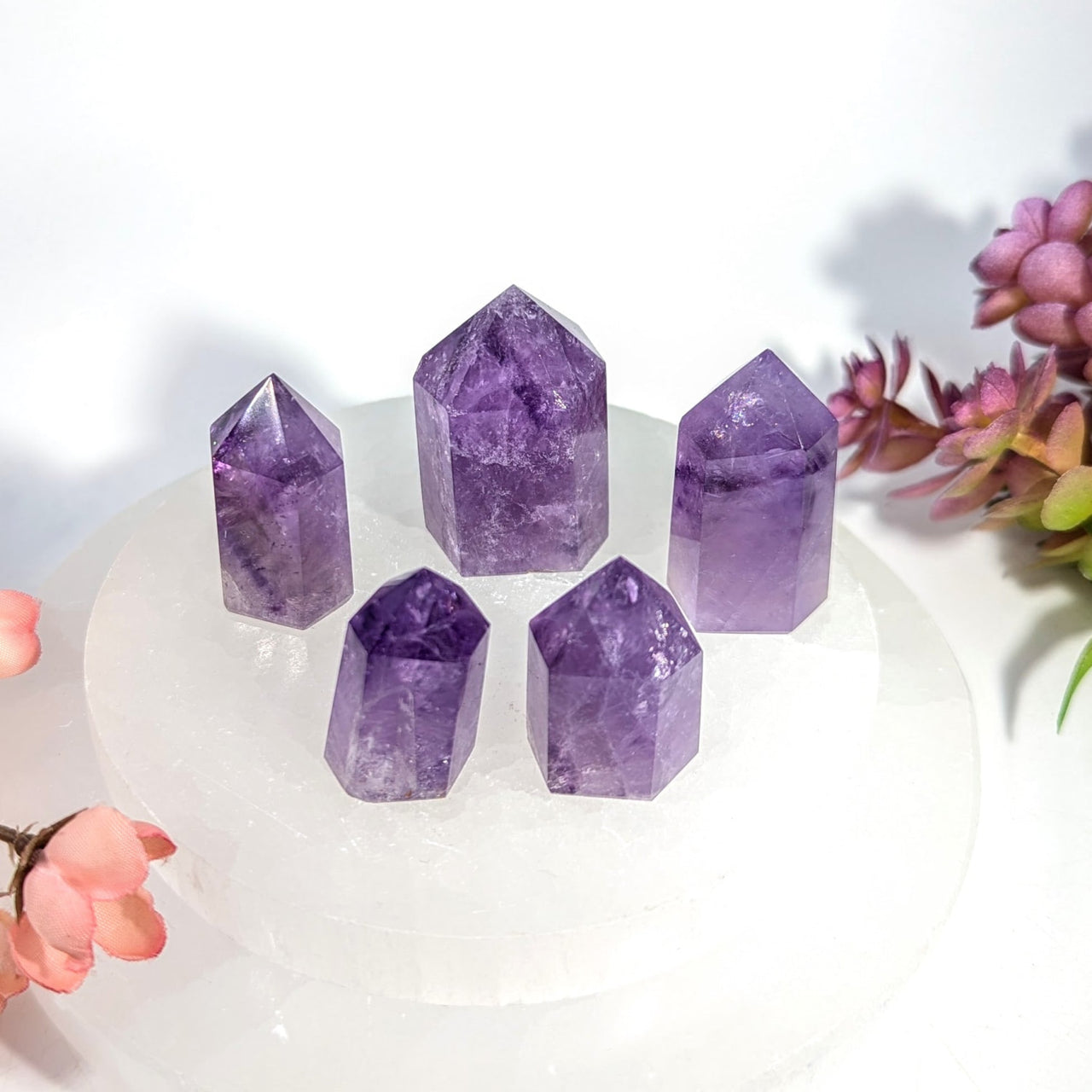 Five polished purple amethyst crystal points on white selenite plate, 1-1.5 inch mini generator