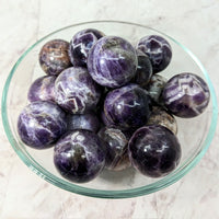 Thumbnail for A close-up of a bowl of purple marbled potatoes on a marble counter; Amethyst Sphere #LV2362