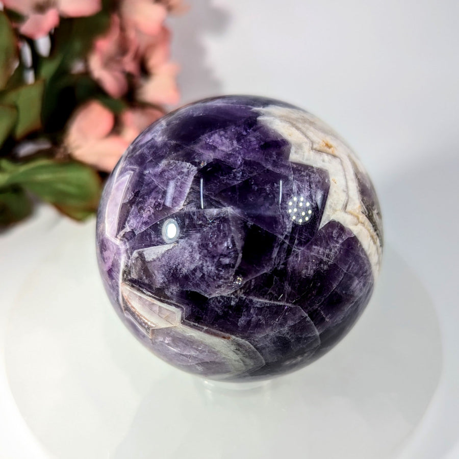 Polished 2.7-inch purple amethyst sphere with white gray veining #BC0201