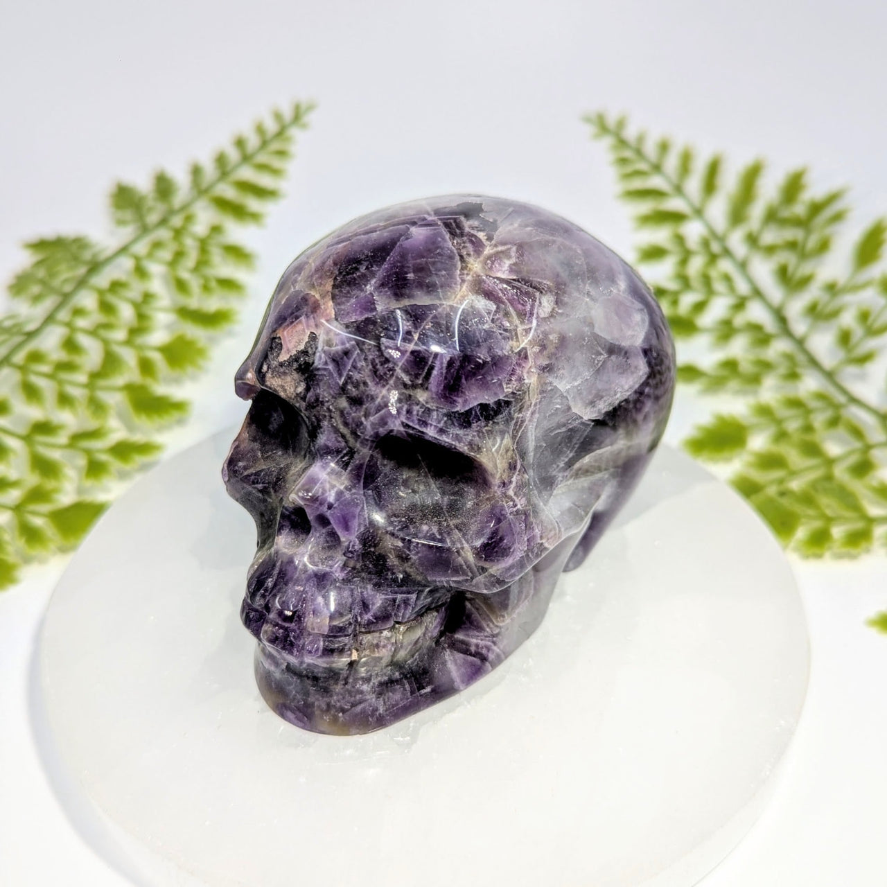 Polished amethyst 3.5-inch skull carving #BC1003 with crystal banding
