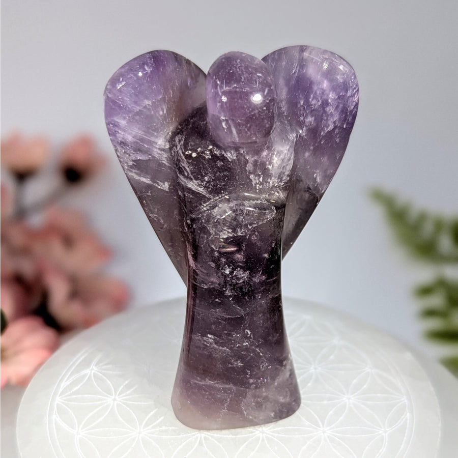 Polished 3’’ amethyst angel carving #BC0750 with purple hues