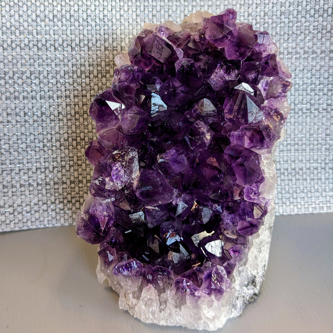 Amethyst crystal cluster in vibrant purple, featured in Amethyst 5.3’ Geode Freeform #LV5418