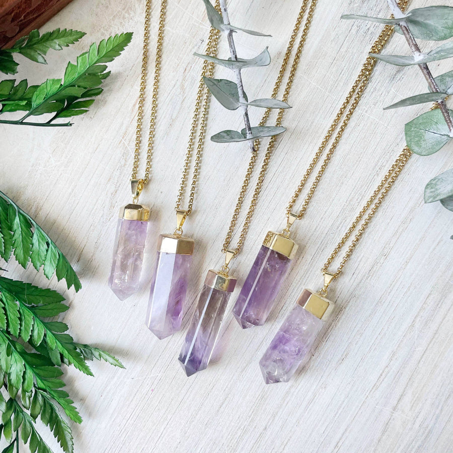 Four Amethyst 6-Sided Point Necklaces on Gold Chains