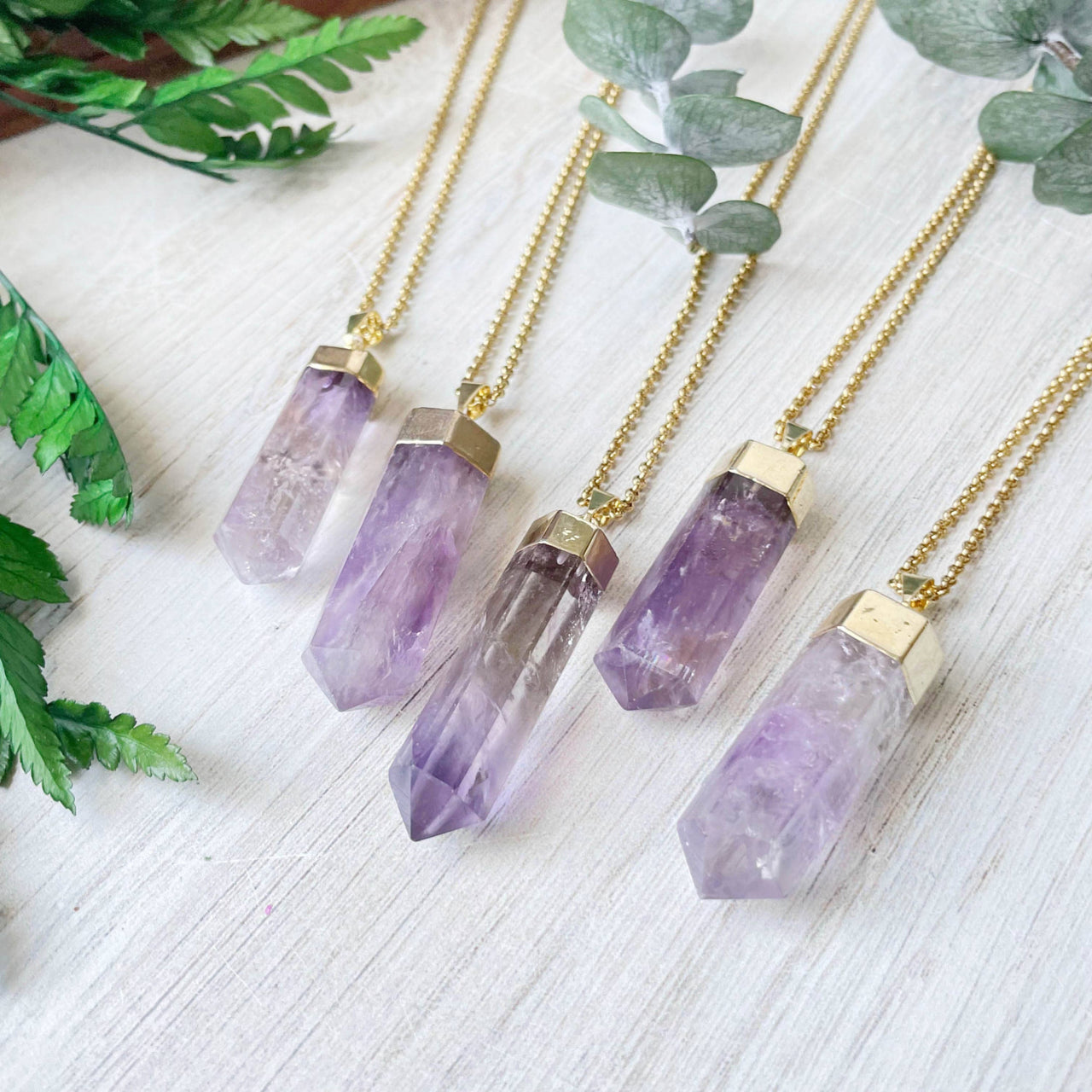 Five Amethyst 6-Sided Point Pendant Necklaces with Gold Caps on 18’’ Chains