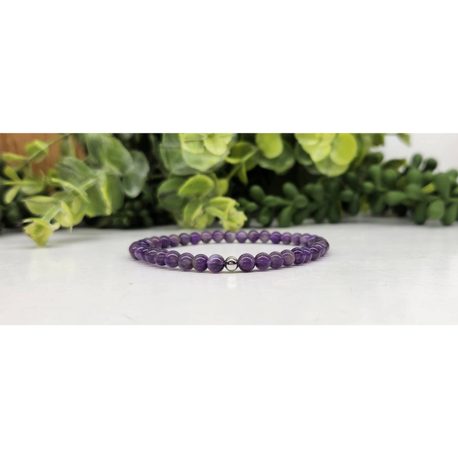 Beautiful stretchable Amethyst bracelet with silver accents from Bliss Crystals