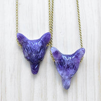 Two purple amethyst carved wolf pendants on 18-inch gold chains