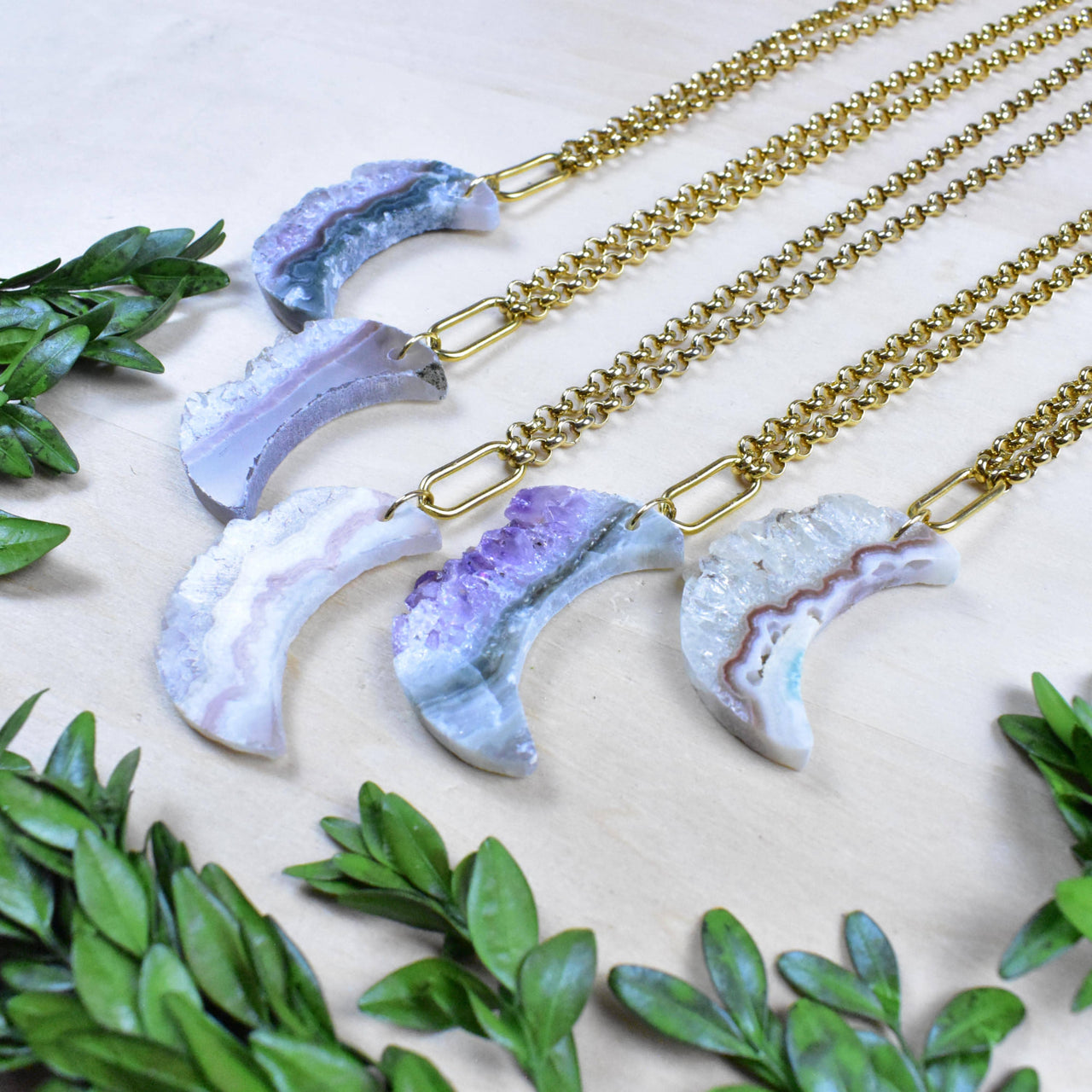Five elegant lavender agate crescent moon pendants on 18’’ gold necklaces