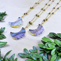 Three elegant purple geode moon pendant necklaces with gold chains