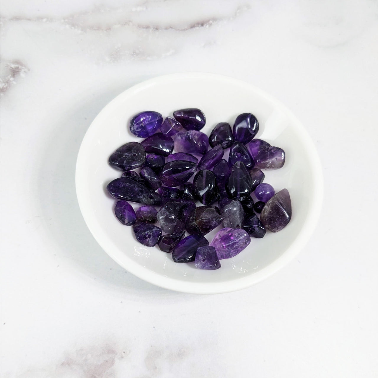 Amethyst crystals in white bowl, Amethyst Dark Bead 4-11 mm Polished Mixed 12 pack #LV3622