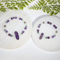 Two purple and clear crystal bead amethyst bracelets featuring faceted gemstones jewelry for elegant wear