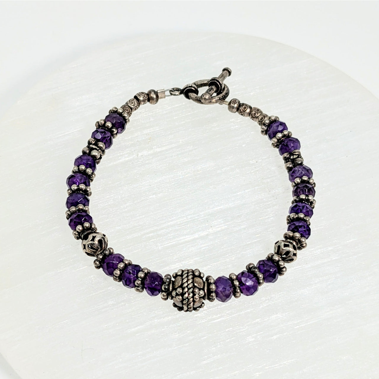 Beaded Amethyst Faceted 7.5’’ Single Strand Bracelet with purple crystals and silver spacers