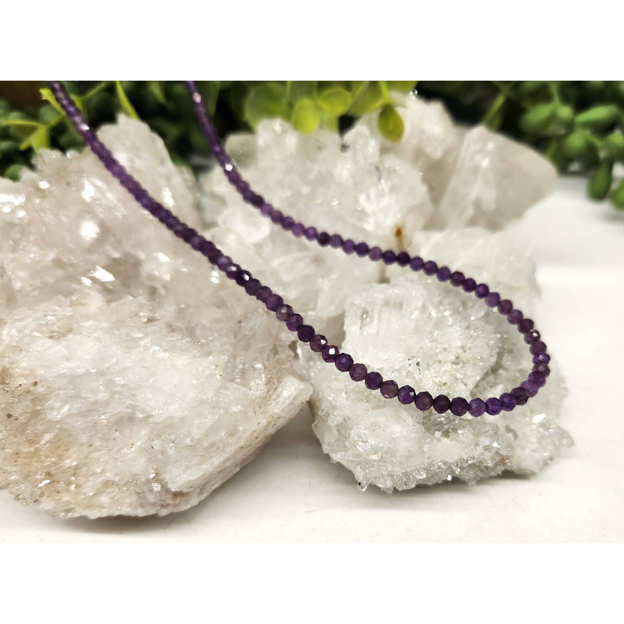 Purple beaded necklace with faceted amethyst beads and silver findings