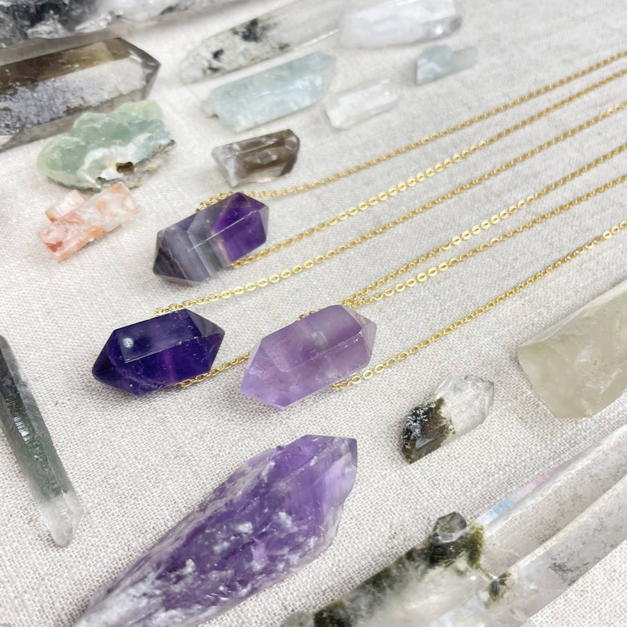 Purple amethyst double terminated point pendant on 18’’ gold chain LV9386