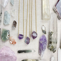 Three delicate gold chain necklaces with unique amethyst double terminated point pendants LV9093