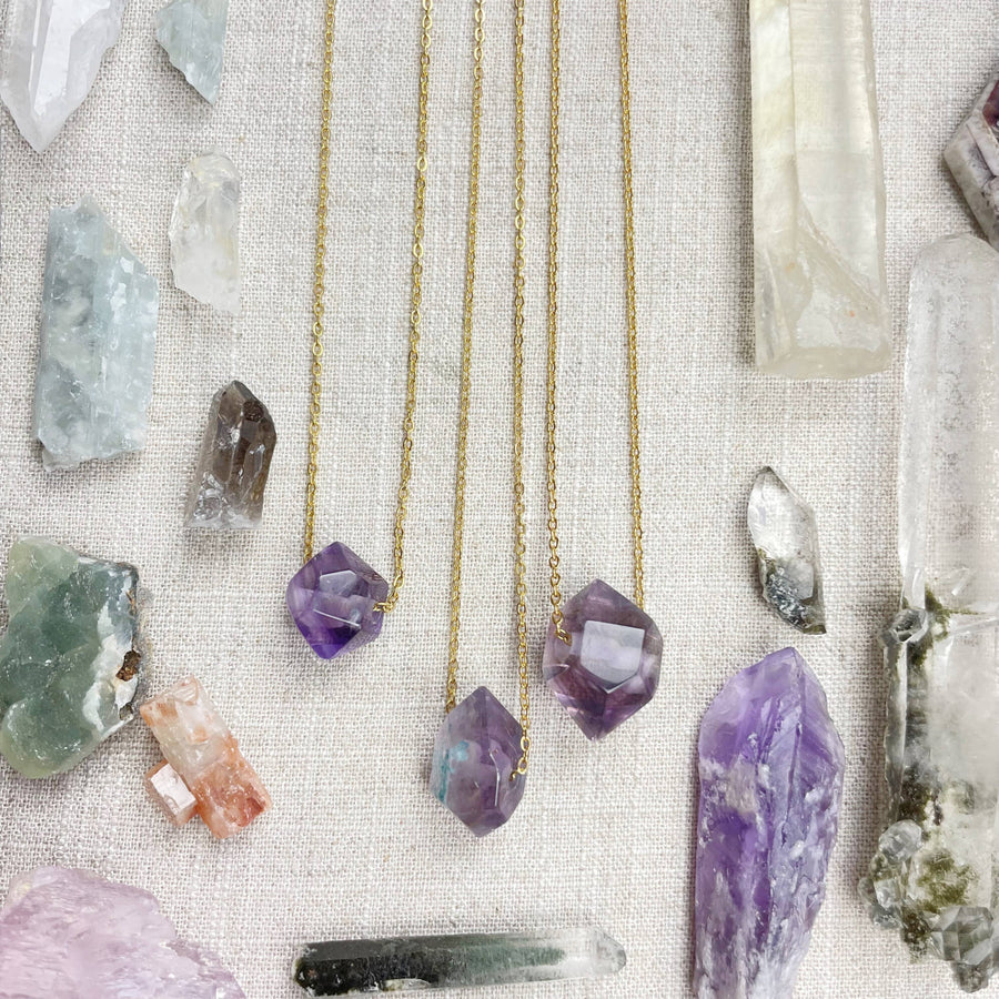 Three delicate gold chain necklaces with unique amethyst double terminated point pendants #LV9093