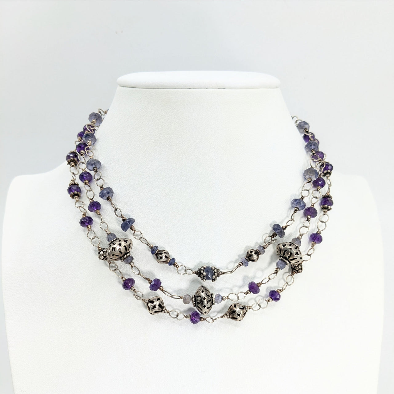 Double-strand necklace with silver beads and purple amethyst crystals for the Amethyst Iolite 14’’ Triple Strand Choker