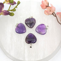 Four amethyst heart pendants with silver clasps, BC0684