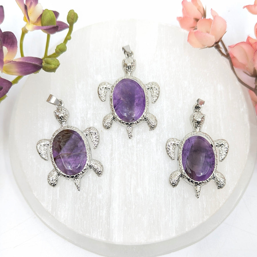 Three silver turtle bezel pendants with faceted oval amethyst, #BC0685
