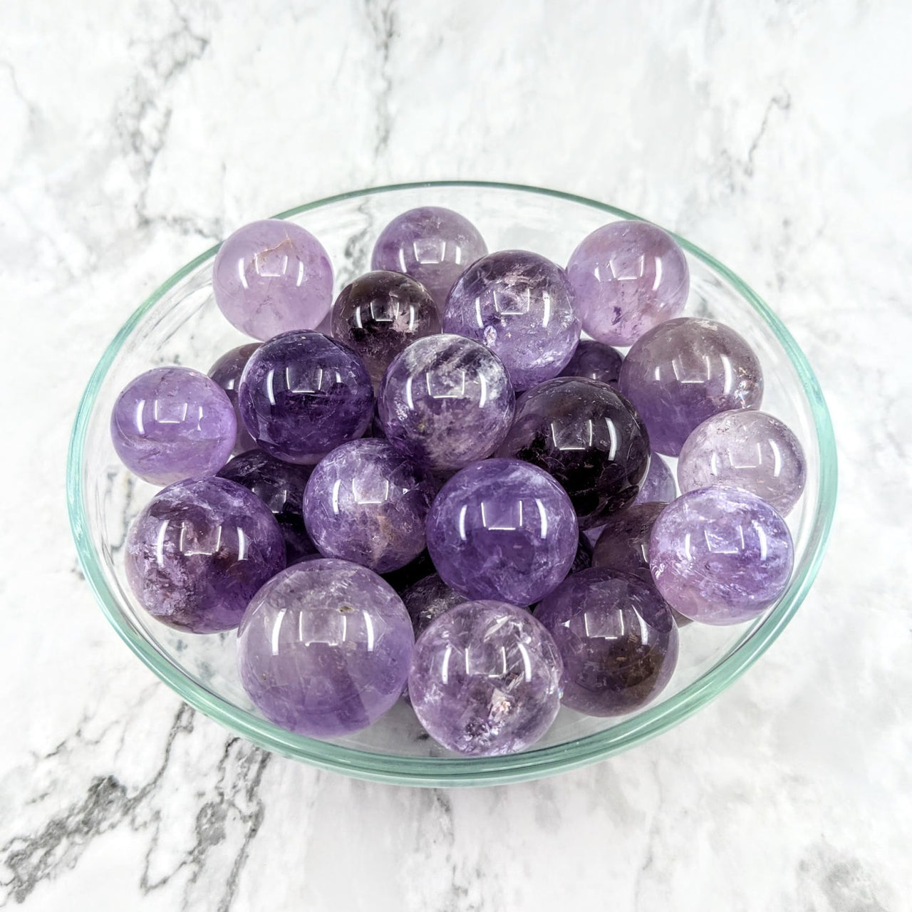 Amethyst Sphere w/ Stand #LV1973 displaying a stunning bowl of amethyst crystals