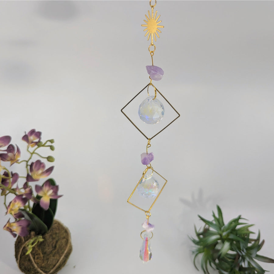 Hanging Crystal Suncatcher displayed with Amethyst Square Ring 17 Mini Suncatcher
