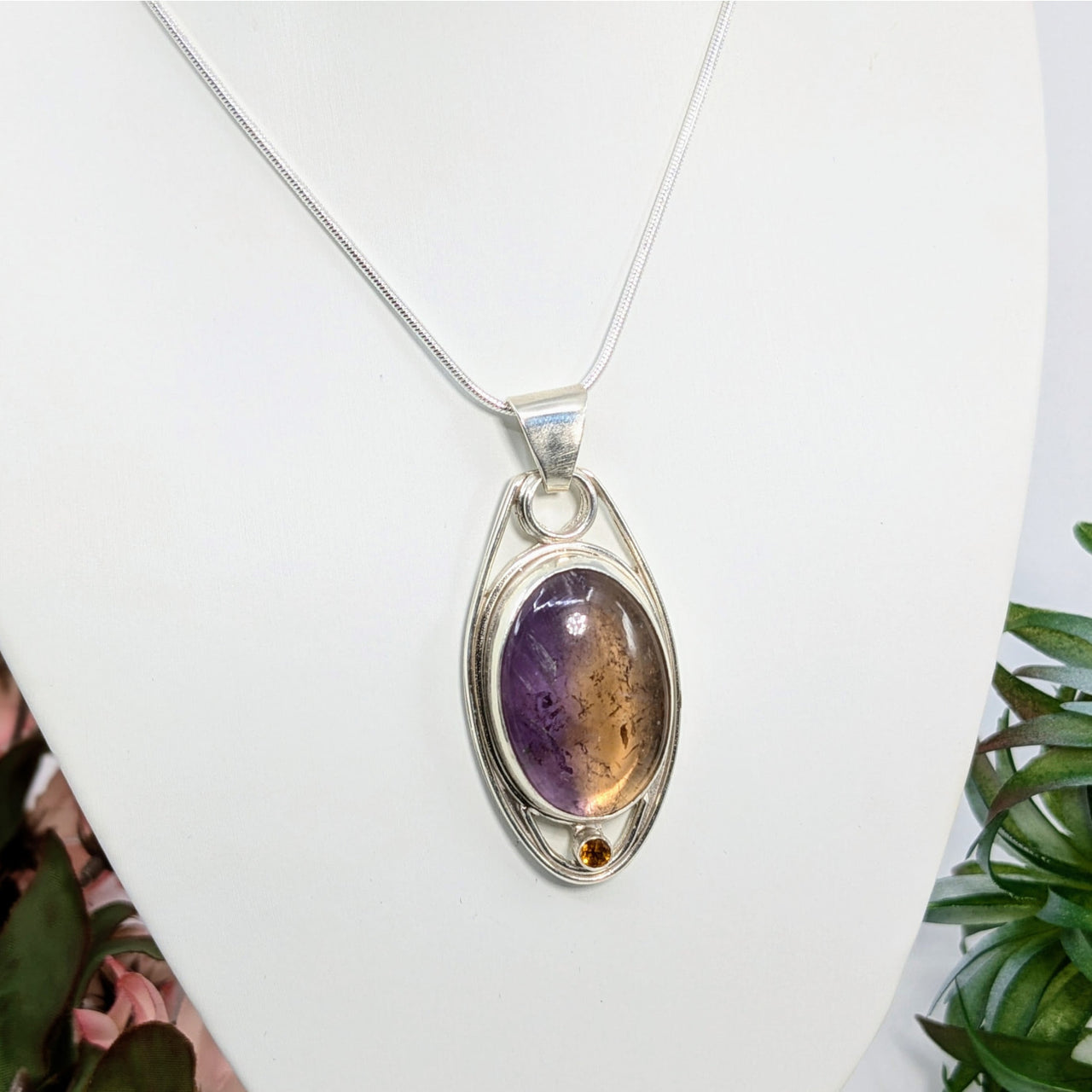 Sterling silver ametrine pendant with intricate metalwork in beautiful design