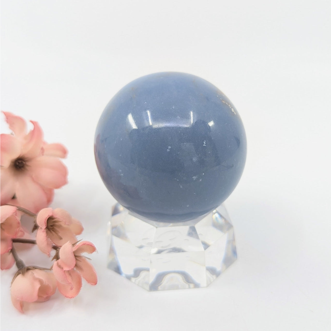Angelite 2.3-inch blue marble sphere on clear glass stand #BC0126
