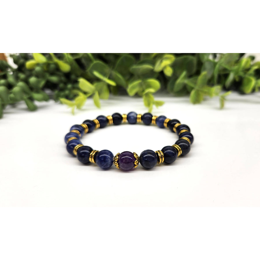 Blue and black glass beaded Anxiety Support bracelet with gold accents and Sodalite Amethyst center