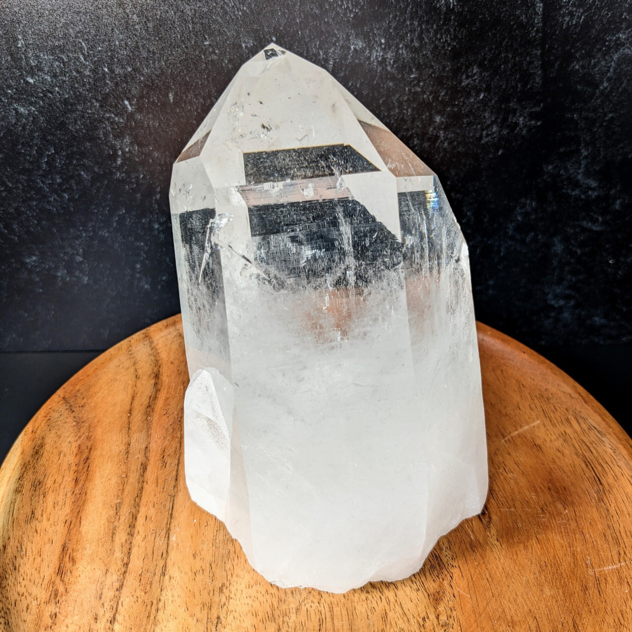 Arkansas Quartz 5.7’ Rough Point #LV2854 on wooden table - natural crystal healing powers