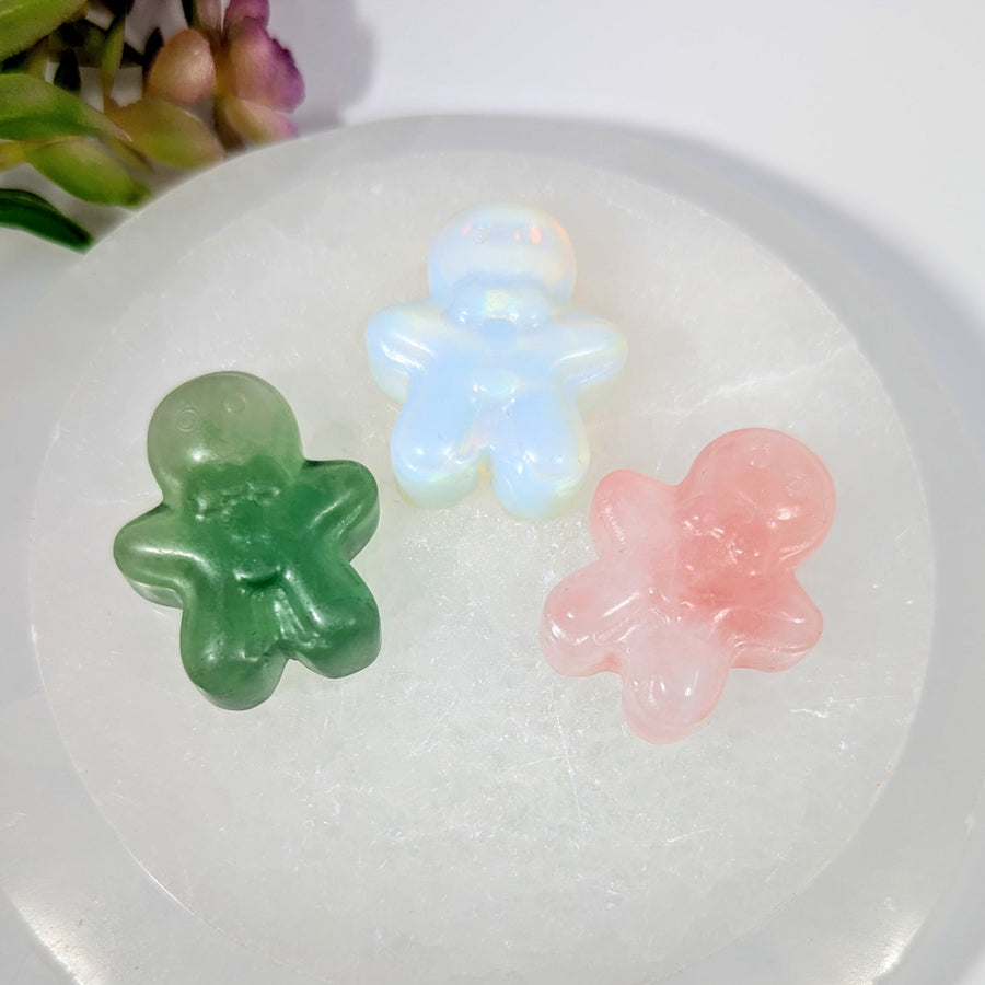 Assorted translucent crystal gingerbread man charms in green, blue, pink