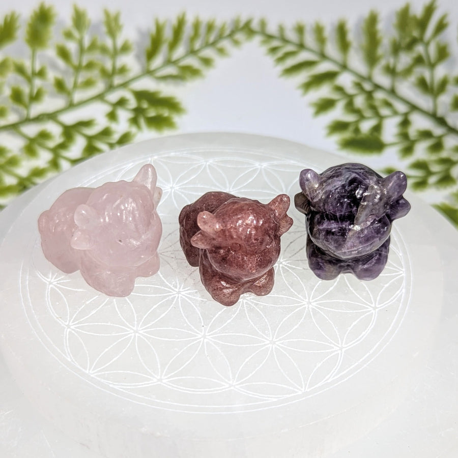 Three 1’’ hand-carved crystal highland cow figurines in pink, brown, purple #BC1220