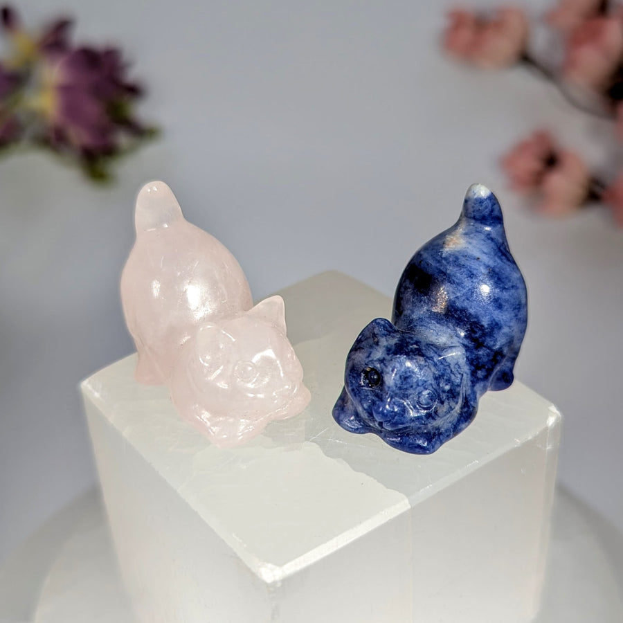 Two polished pink and blue gemstone cat figurines on quartz block, #BC0708