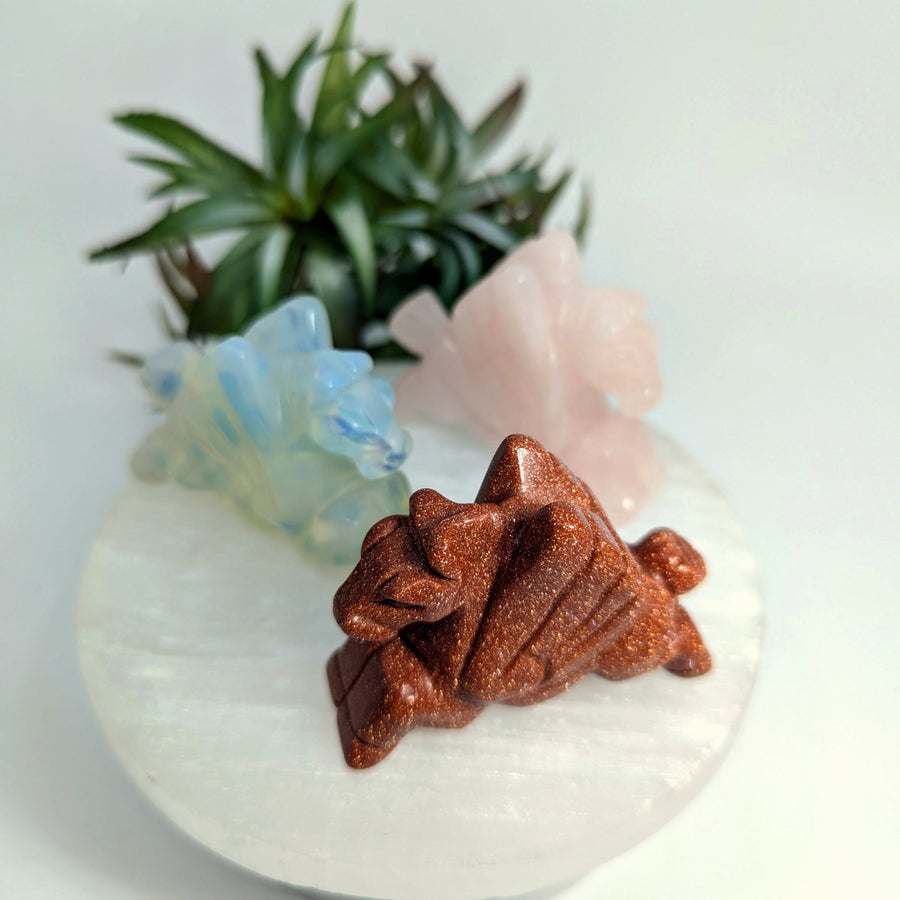 Four crystal mountain carvings displayed in Assorted Stone 2.3 Pegasus Carving product