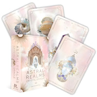 Astral Realms Crystal Oracle deck by Leah Shoman displayed with colorful crystals