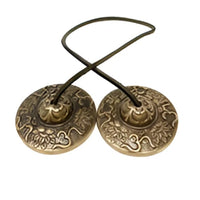 Antique brass Tibetan singing bowls with engravings, black cord