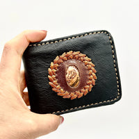 Authentic black leather bifold wallet with braided tan leather oval and stone accent #BC0422