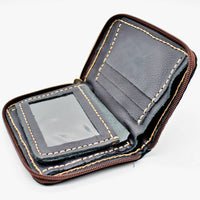 Authentic pebble grain leather zippered wallet with ID window and stone accent