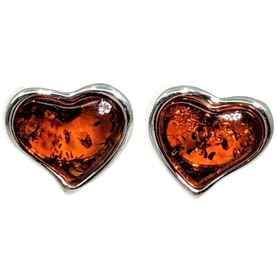 Heart stud earrings featuring Baltic Amber set in silver, perfect for any occasion