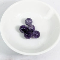 Thumbnail for Banded Amethyst 10 mm Round Bead Pack #LV3620 displayed in a white bowl filled with purple marble