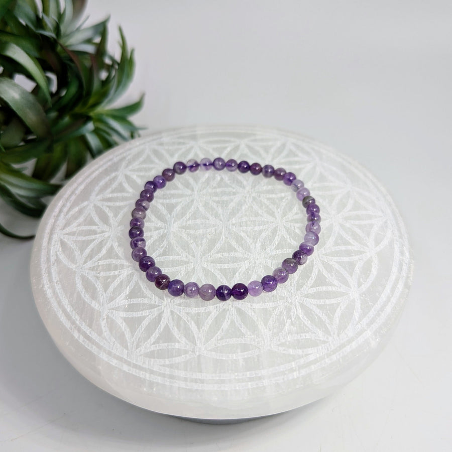 Purple beaded bracelet from the Banded Amethyst 7 Inch Bracelet 4mm collection